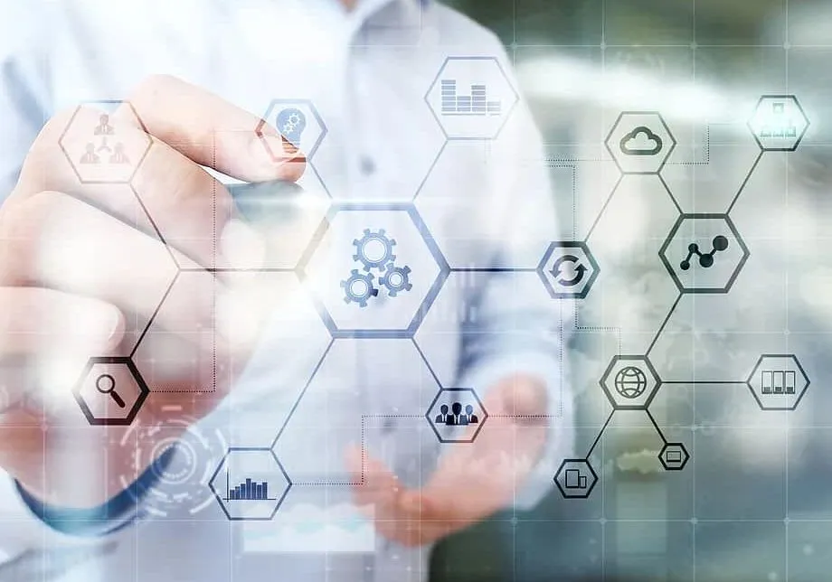 Team collaborating around a workstation